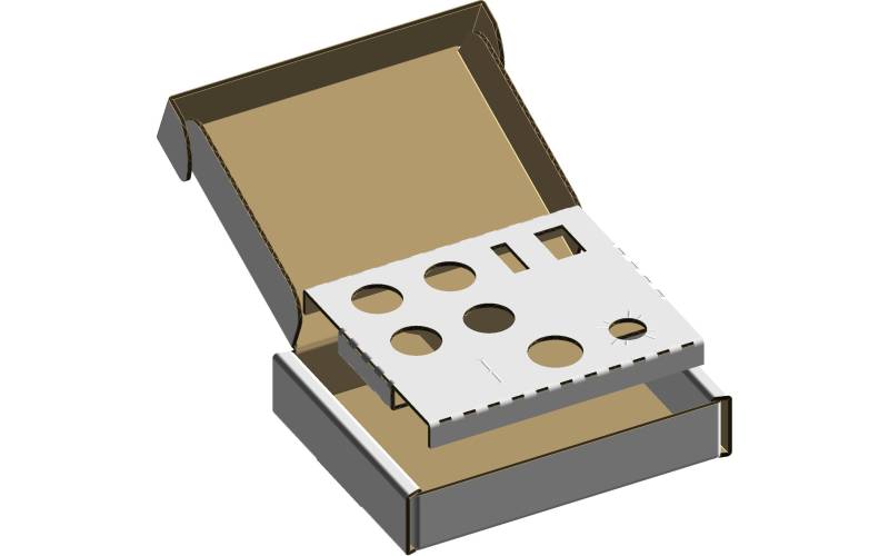 Une boite découpée et un calage de petite taille pour des accessoires de robinetterie près de Chambéry